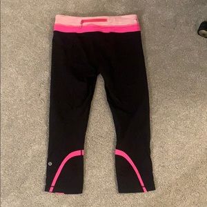 Lululemon cropped leggings with pink stripes